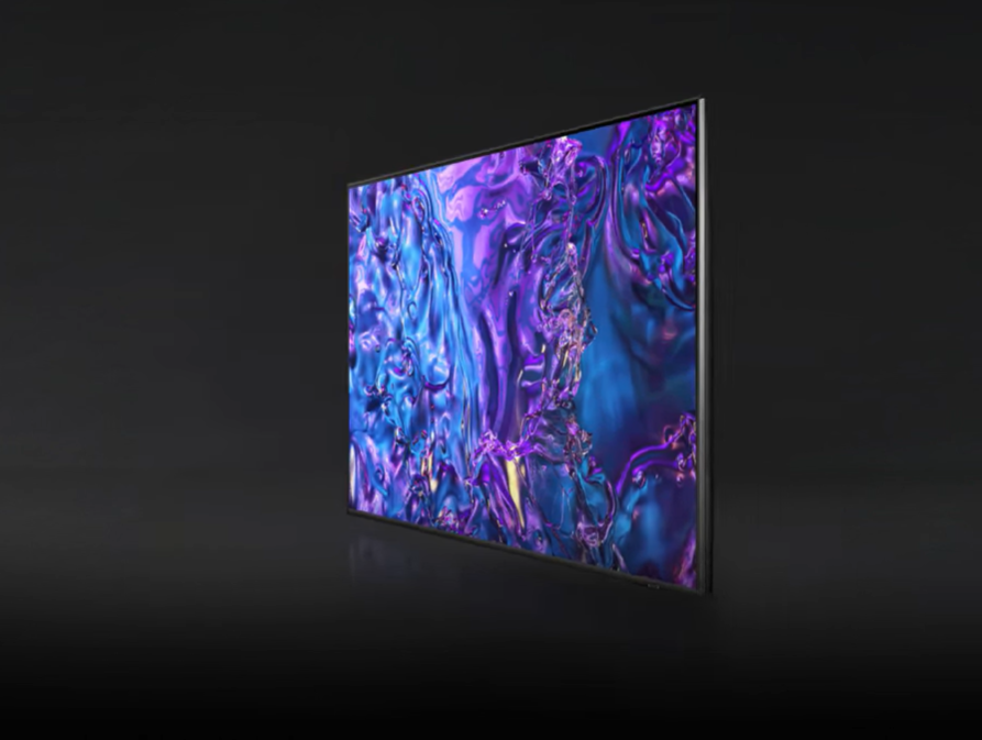 טלוויזיית Samsung QLED Q70D 4K: תמונה מדהימה ועיצוב מודרני בתמונה זו רואים טלוויזיית Samsung QLED Q70D 4K מרשימה בגודלה, המציגה תמונה צבעונית ועשירה. הטלוויזיה בעלת עיצוב ללא גבולות, המעניק לה מראה מודרני ומינימליסטי. המסך כמעט ללא מסגרת, מה שמאפשר לכם ליהנות מחוויית צפייה סוחפת יותר.