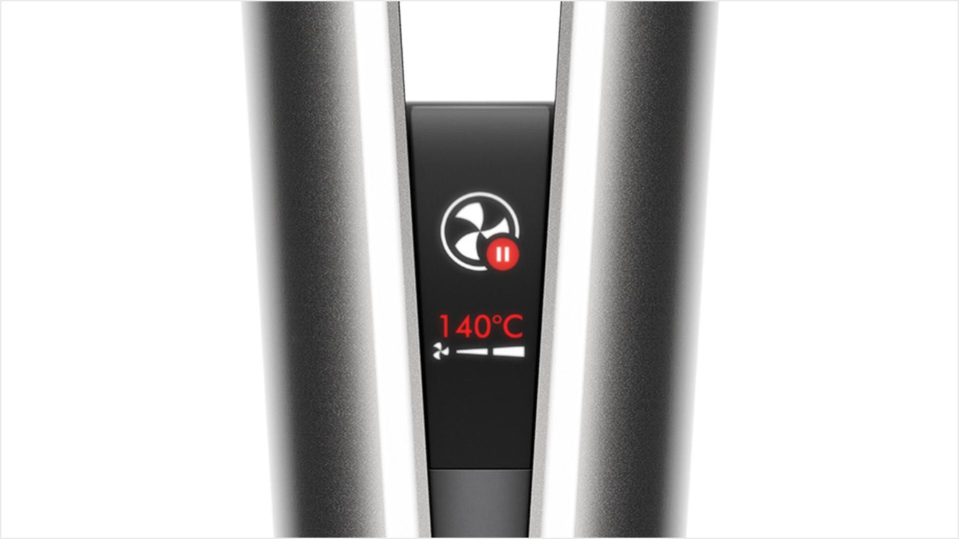 Dyson Airstrait™ straightener HT01 תקריב מסך ה-LCD של Dyson Airstrait, מראה את האנימציה של ההשהיה האוטומטית.